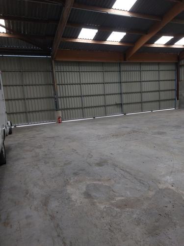 Photo de l'annonce : Grande place dans hangar fermé - à l'année uniquement - 5mn de Caen